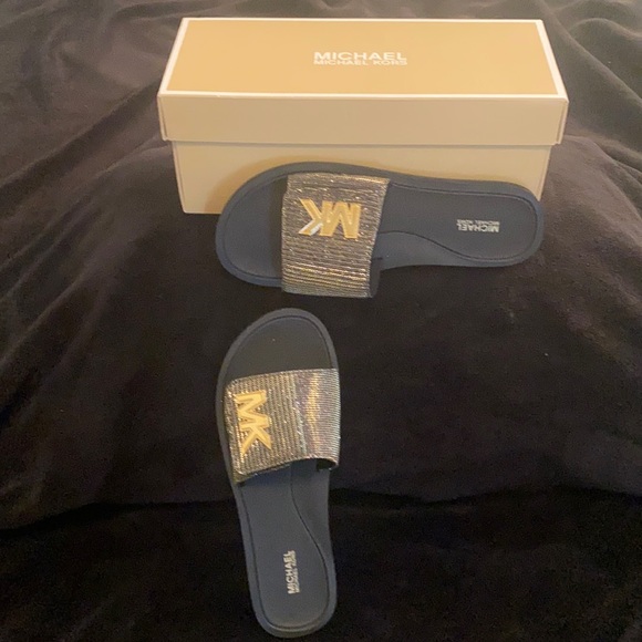 Michael Kors Shoes - MICHAEL KORS Black and Gold slides Size 9M